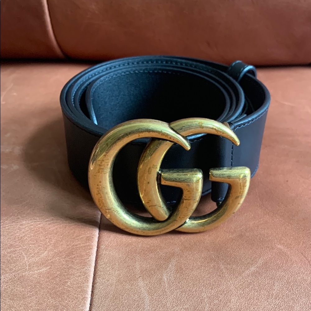 Gucci Black and Gold Leather Belt with Iconic GG Buckle